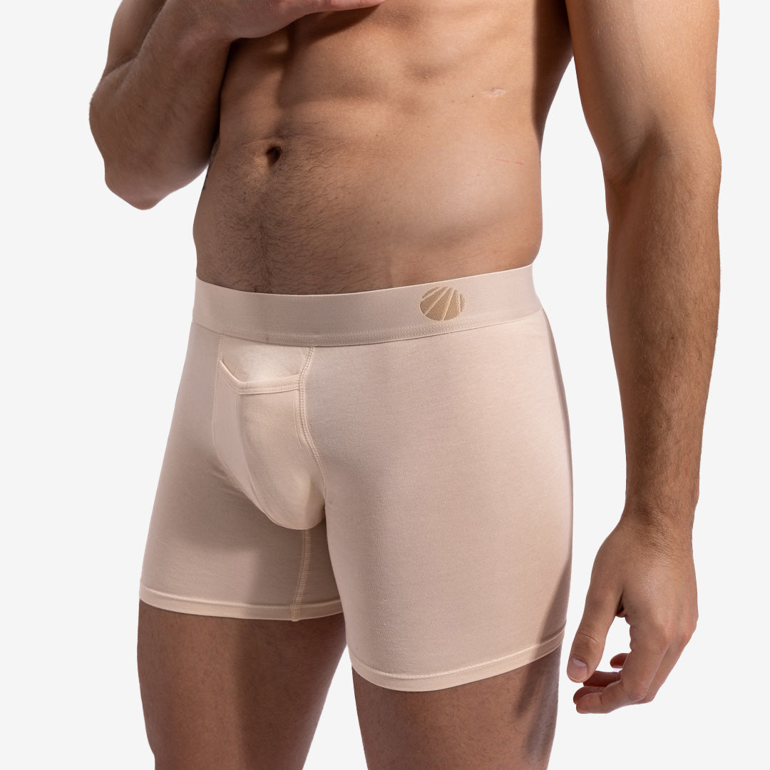 Beige men's underwear with a brand logo on a white background
