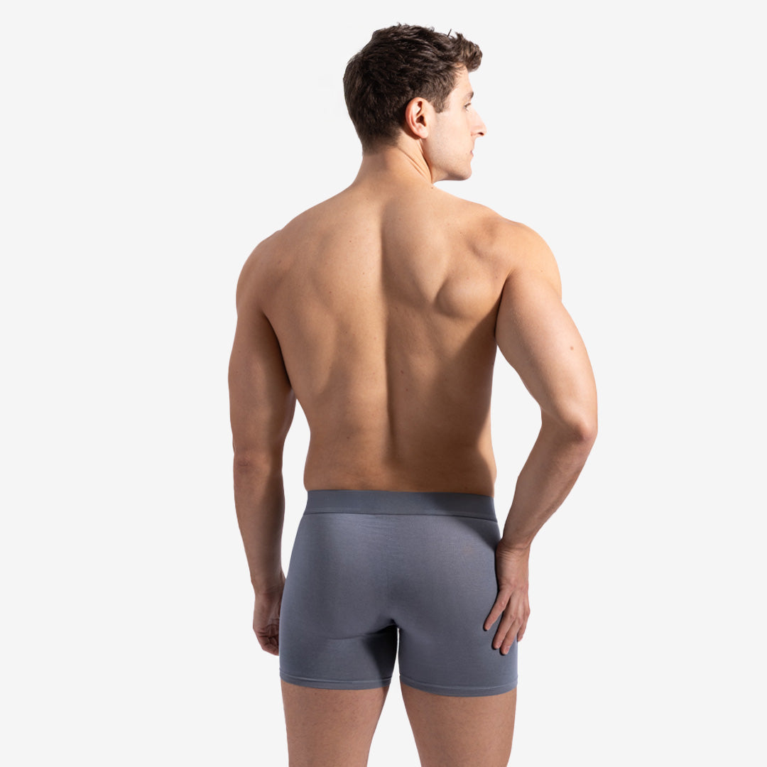 Man wearing gray underwear on a white background